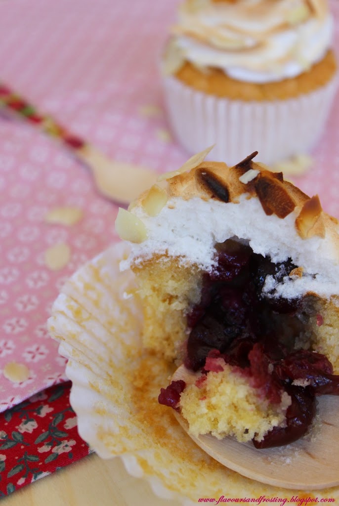 Cherry Almond Cupcakes topped with toasted italian meringue frosting