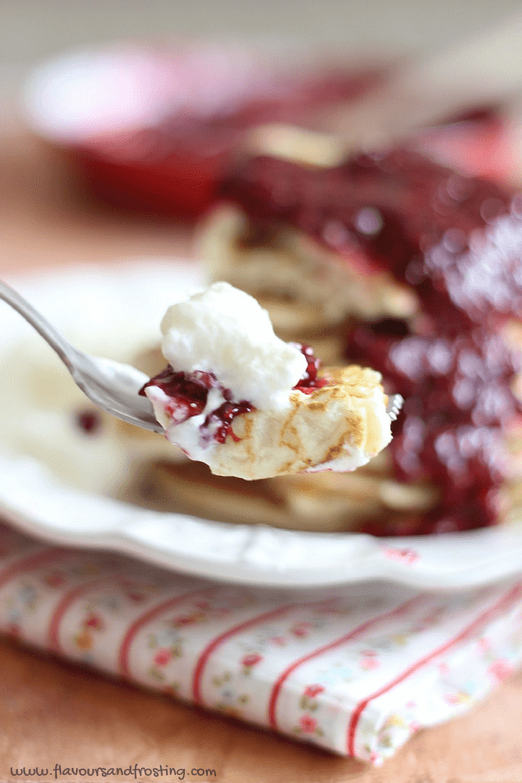 Raspberry Pancakes also called Raspberry Crepes made with Homemade Raspberry Sauce