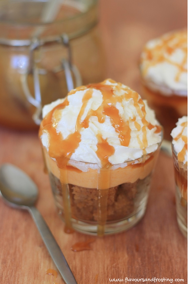 Easy Salted Caramel Pumpkin Cheesecake Parfait made with homemade salted caramel sauce, pumpkin cream cheese, pumpkin spice bundt cake and topped with freshly whipped cream.