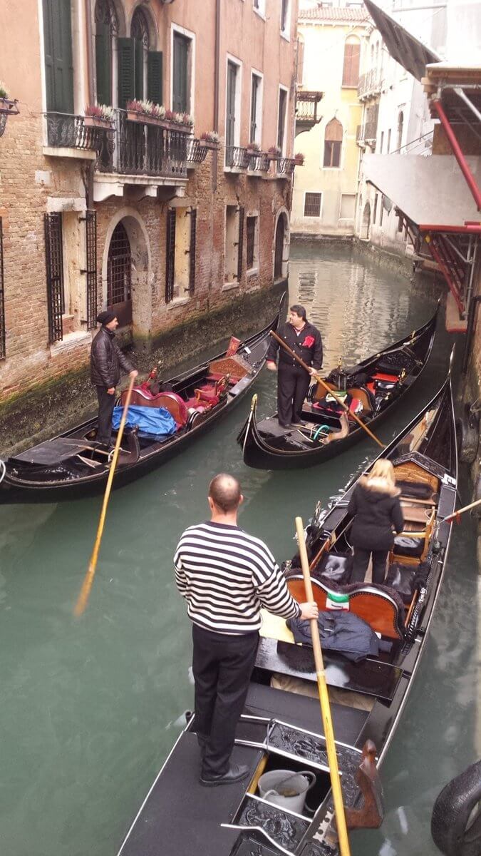 Tourist attractions in Venice. Punting in Venice on a Gondola.